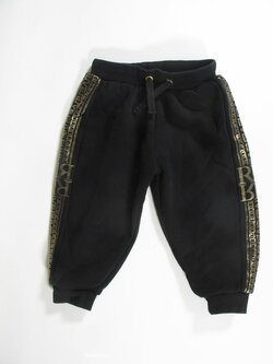 Tepláky černo zlaté pro holky secondhand Tepláky černo zlaté pro holky secondhand