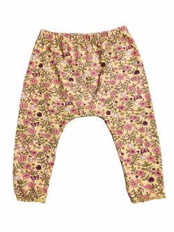 Žluté elasťáky s kytičkami pro holky secondhand Next