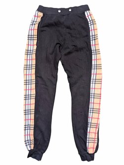 Černé tepláky s pruhy pro kluky secondhand Černé tepláky s pruhy pro kluky secondhand