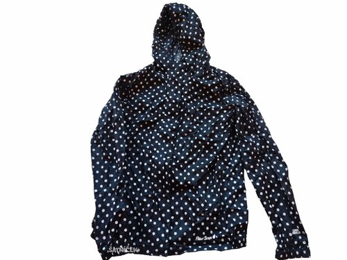 Černá bunda šusťáková s puntíkami pro holky secondhand Peter Storm