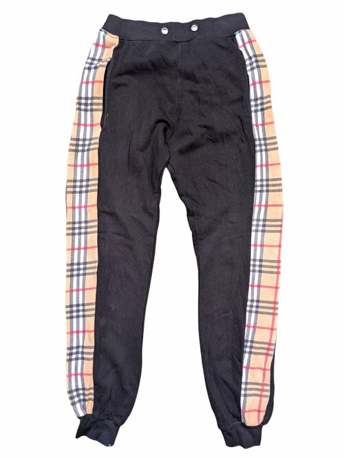 Černé tepláky s pruhy pro kluky secondhand